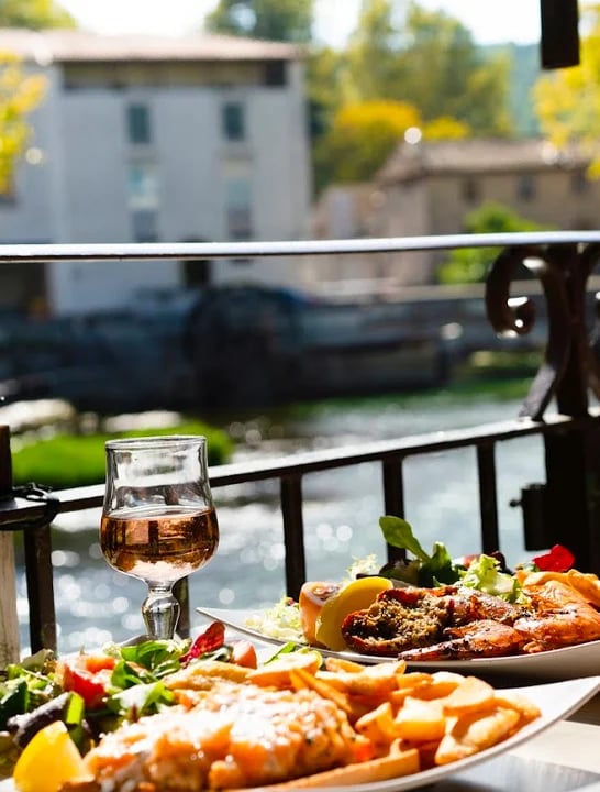 Riverside meal on a flavour cycling holiday
